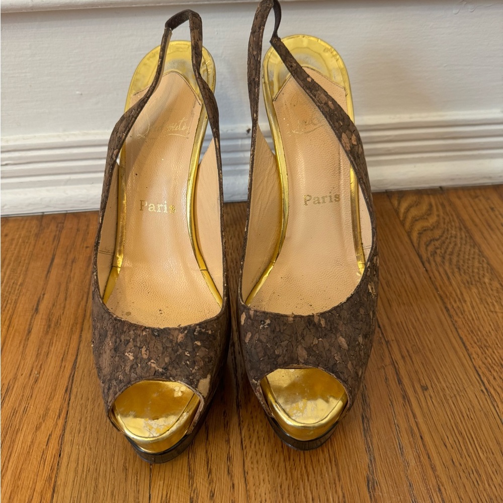 Christian Louboutin cork sling back
Size 41 1/2